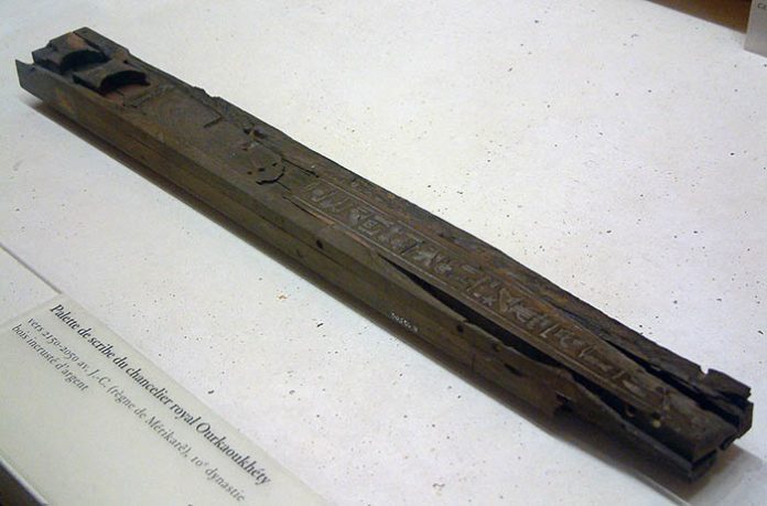 Scribe palette of the chancellor Orkaukhety, with the cartouche of Merikare.Picture from: https://upload.wikimedia.org/wikipedia/commons/thumb/5/5f/Egypte_louvre_249_palette.jpg/1280px-Egypte_louvre_249_palette.jpg Scribe palette of the chancellor Orkaukhety, with the cartouche of Merikare.Picture from: https://upload.wikimedia.org/wikipedia/commons/thumb/5/5f/Egypte_louvre_249_palette.jpg/1280px-Egypte_louvre_249_palette.jpg