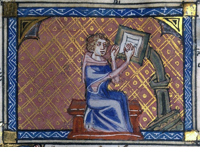 The-author-of-a-manuscript-at-his-writing-desk-14th-Century-